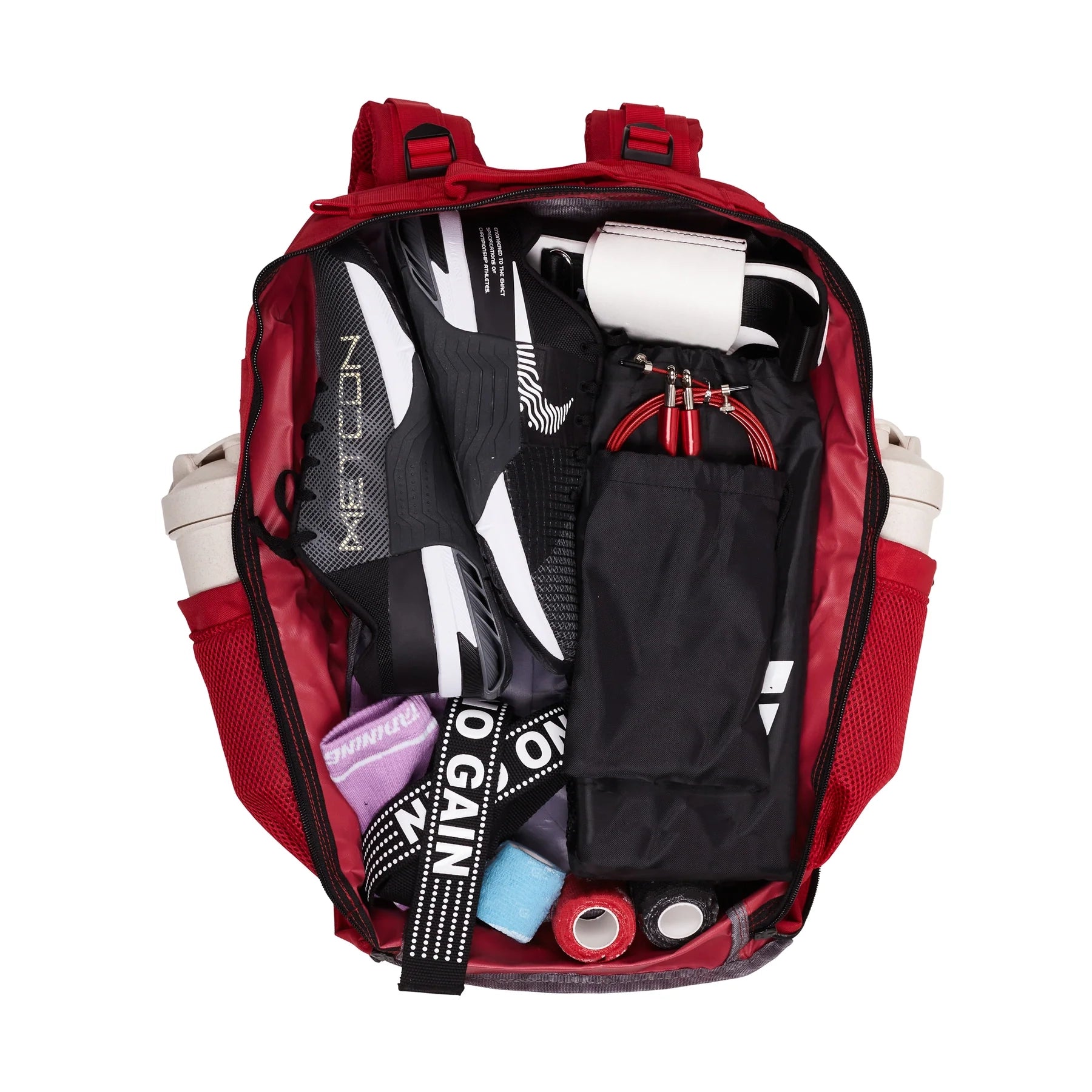 Mochila Gympack Pro 50 Litros Vermelha - Vista do Bolso Principal Aberto com Itens Guardados